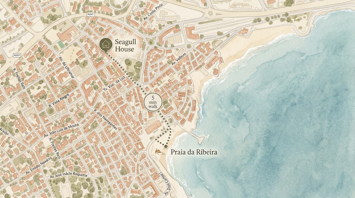Minimalist map of Cascais centre showing Seagull House as a red dot and the short walking route down to the beach